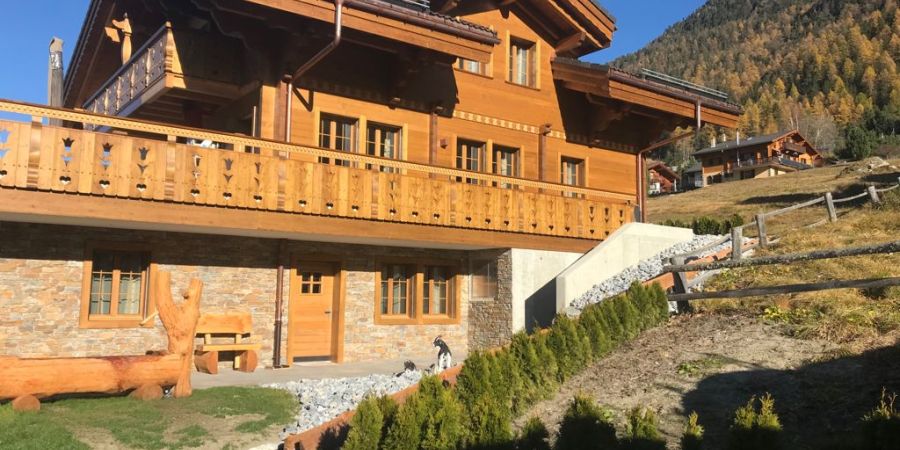 Holzfassade-Neubau-Chalet